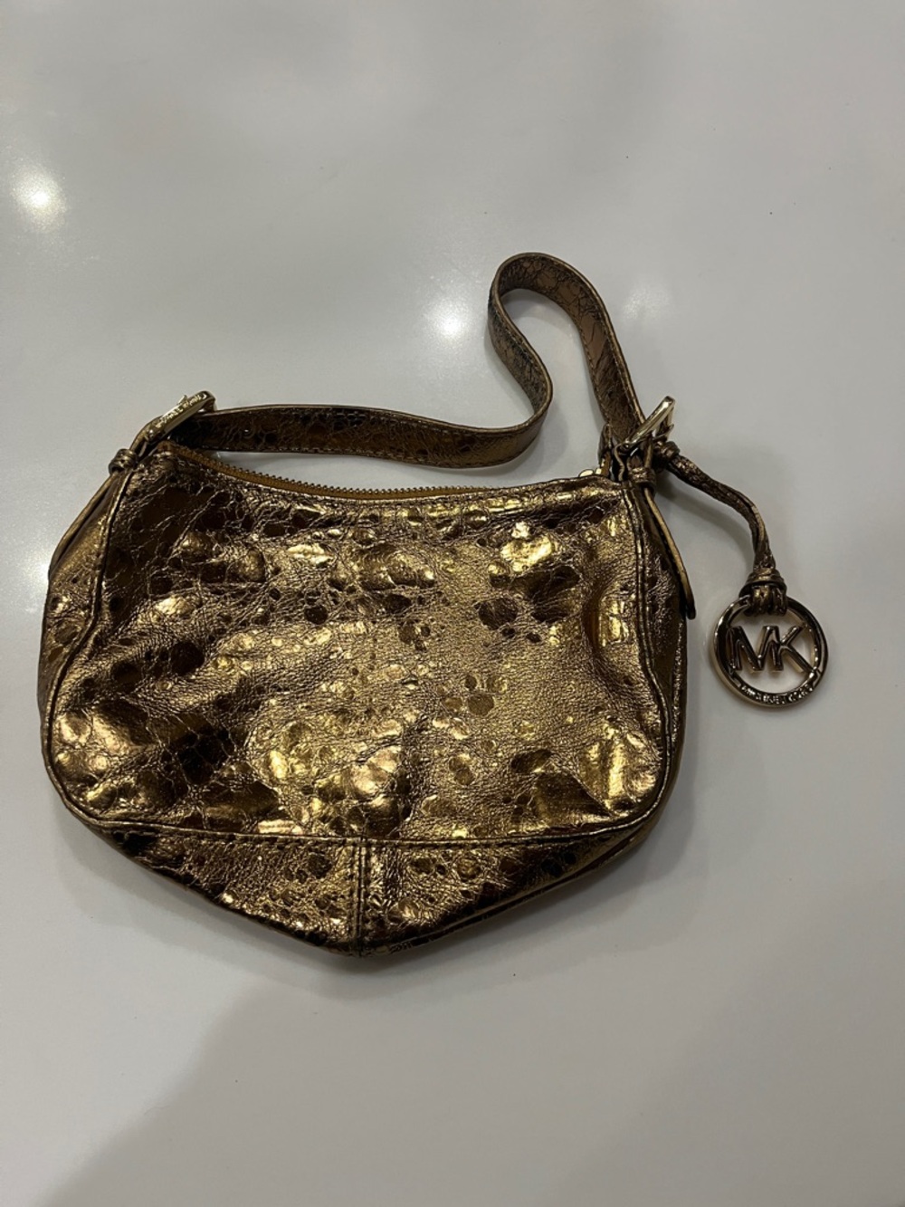 MICHAEL Michael Kors Metallic Bronze Gold Wristlet with MK Charm
